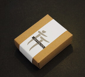Small box with the Attilio logo during the packing process